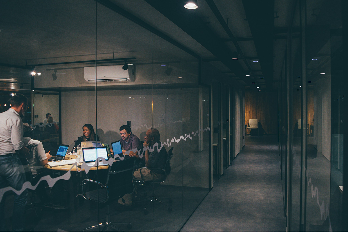 Corporate team collaborating in a modern office